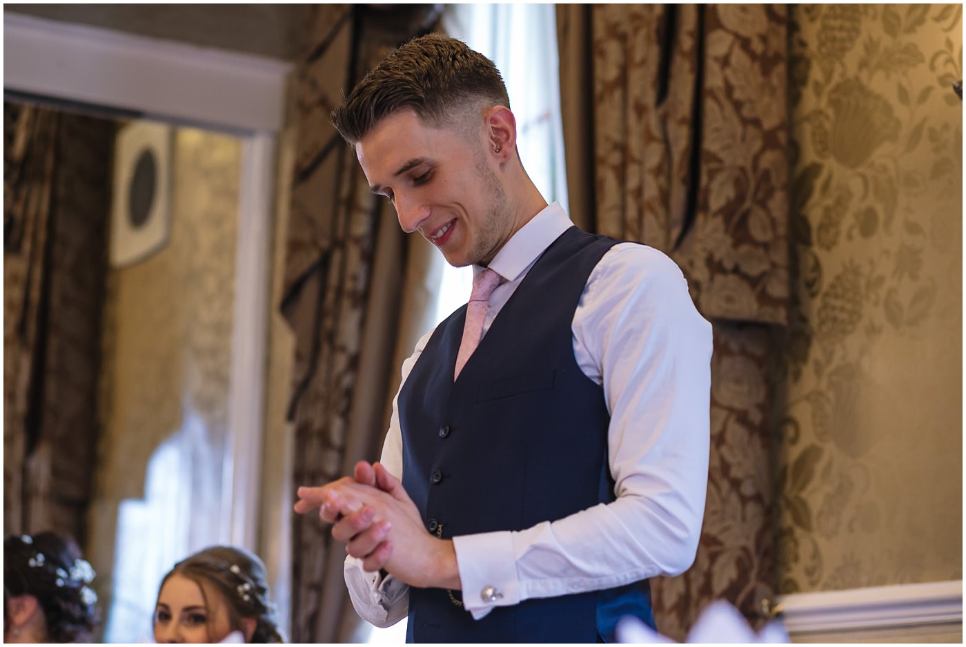 groom nervously gives his wedding speech