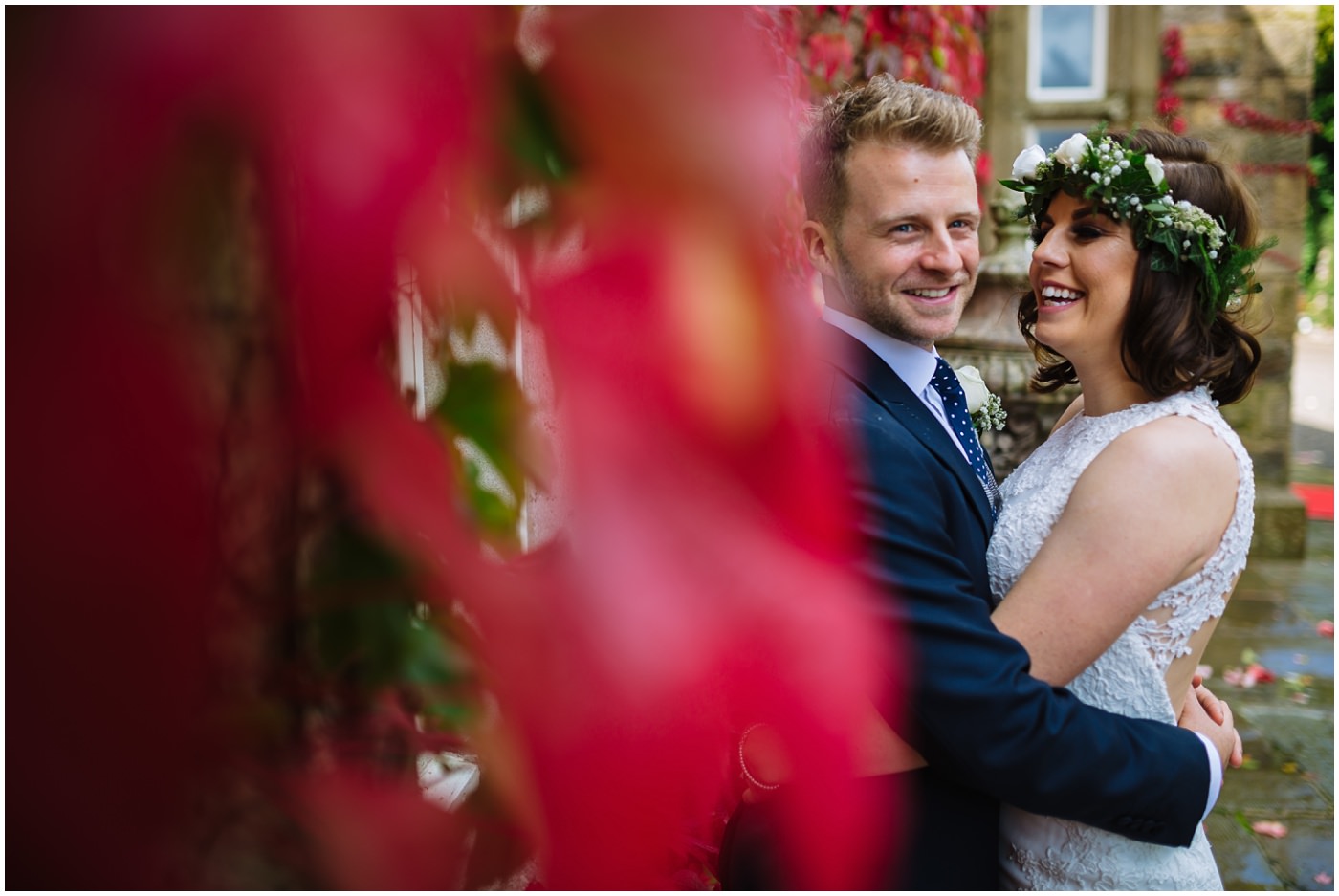 Bride and groom share a moment during portraits at Mitton Hall