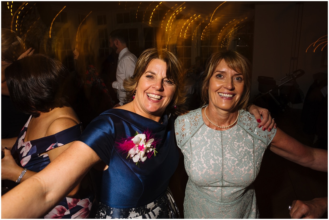 mother of the bride on the dance floor at mitton hall