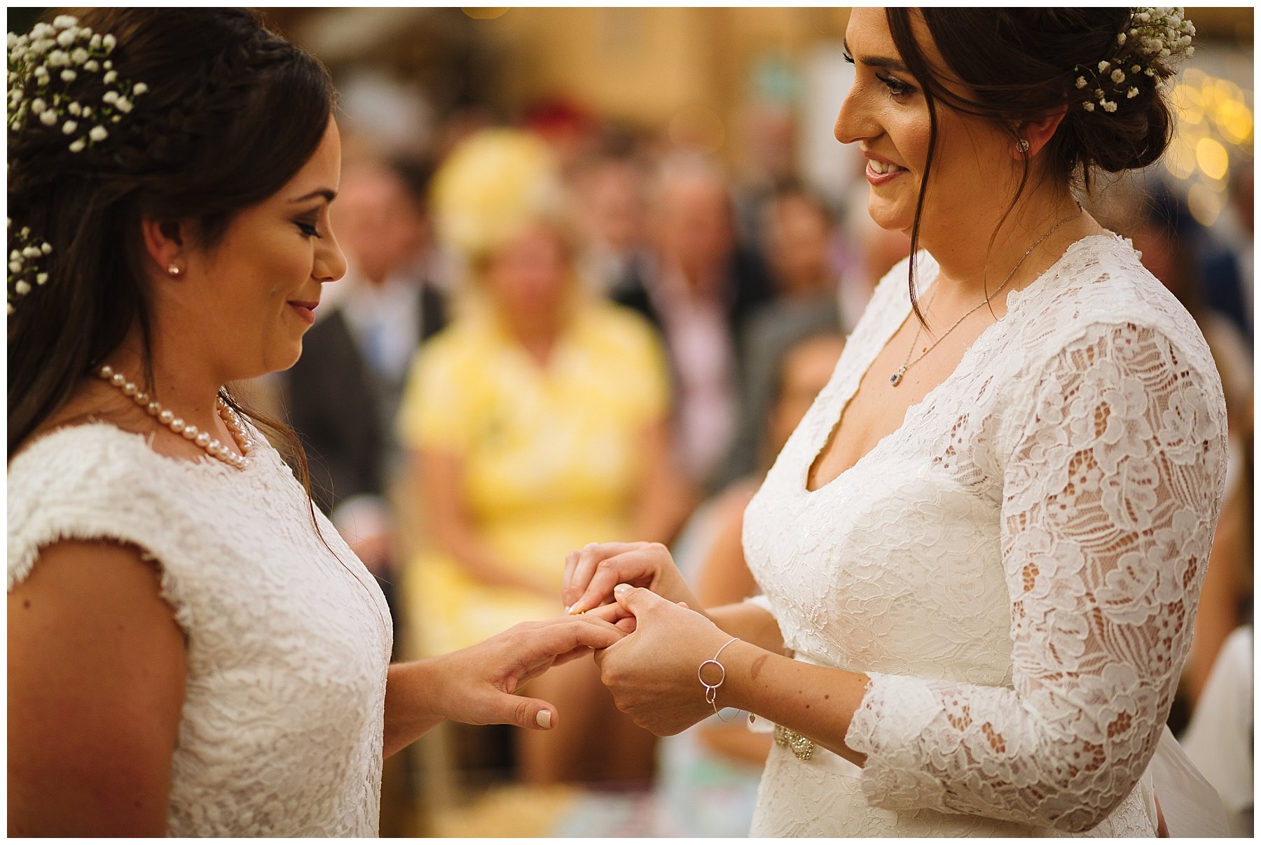 brides exchange rings during wellbeing farm wedding