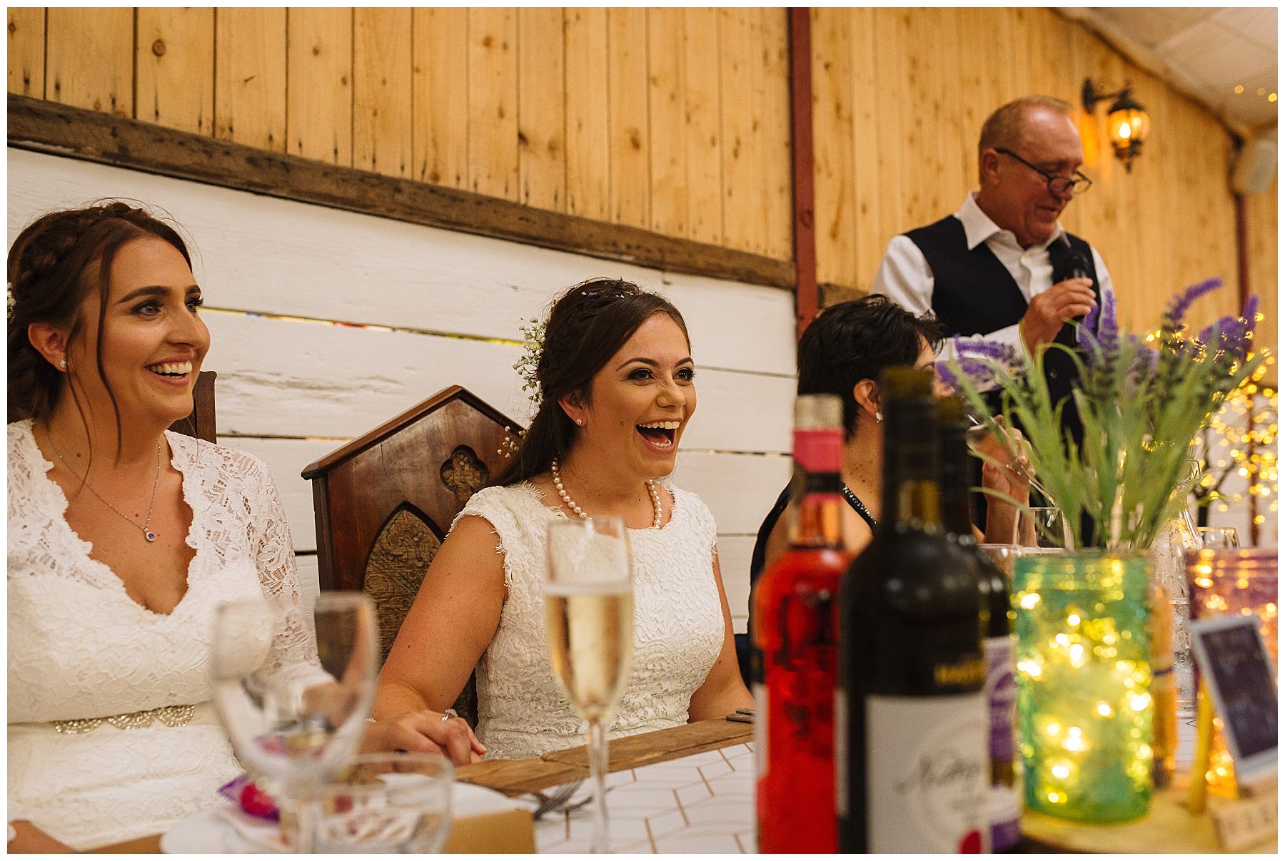 brides laugh reacting to fathers speech