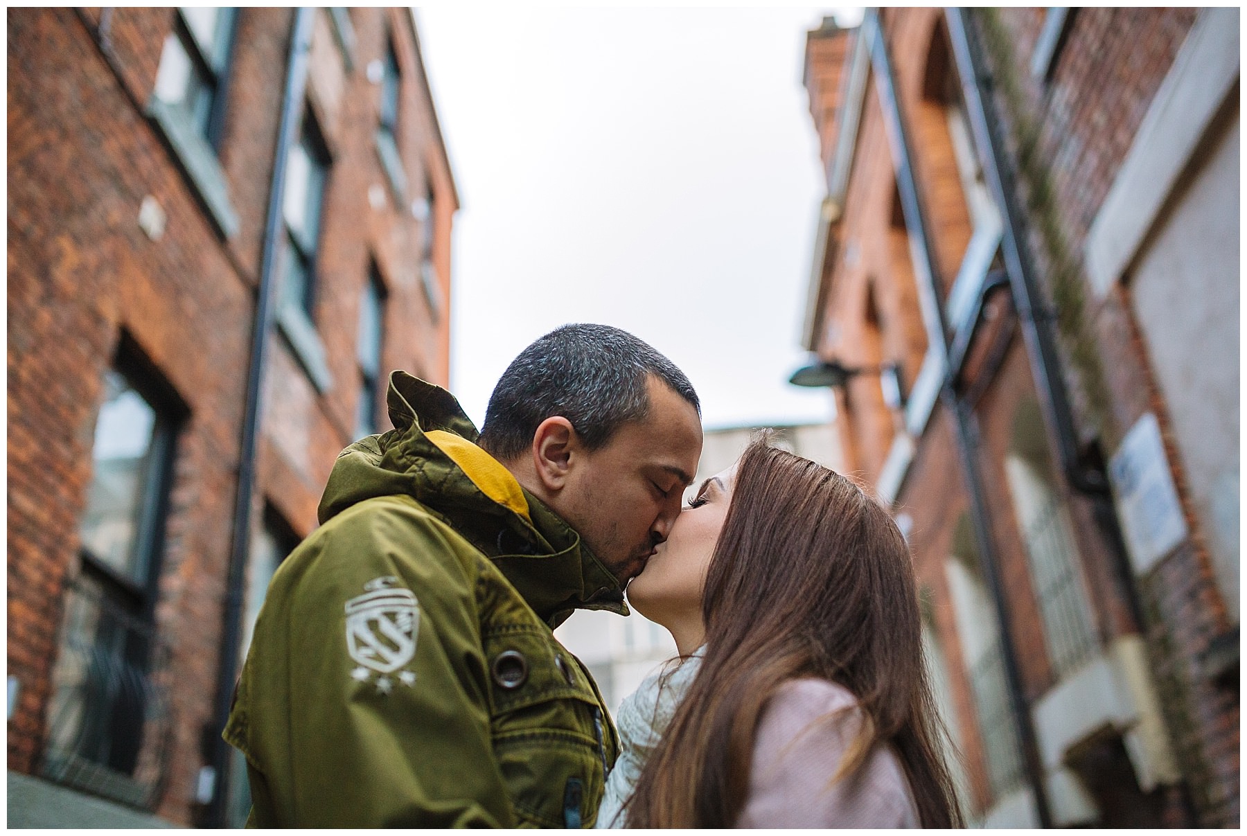 Couple kiss in streets of manchester