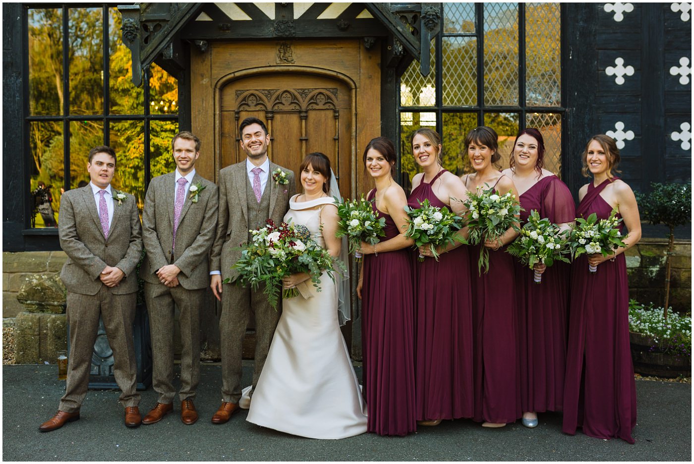Bridal party at the front of samlesbury hall