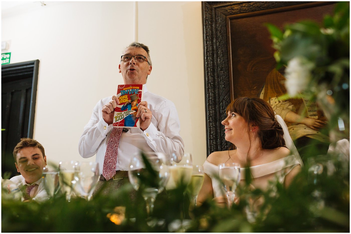 father of the bride uses a joke book to make his speech and instant hit